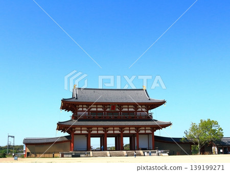The reconstructed Suzaku Gate stands under a clear blue sky at the Heijo Palace Site, a World Heritage Site in Nara City. The reconstructed Suzaku Gate stands under a clear blue sky at the Heijo Palace Site, a World Heritage Site in Nara City. 139199271
