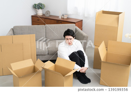 A young man preparing to move: Lifestyle image A young man preparing to move: Lifestyle image 139199356