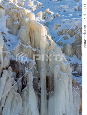 Icicles on the rocks 139199451