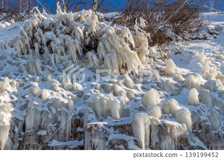 Icicles on the rocks 139199452