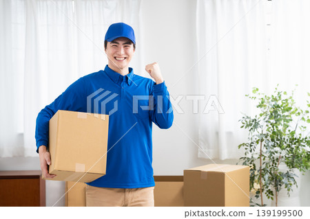 A young man working in the moving industry; lifestyle image 139199500
