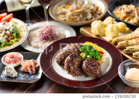 A course meal with hamburger steak at an Italian restaurant. A course meal with hamburger steak at an Italian restaurant. 139200230