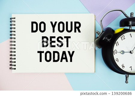 Do Your Best Today text written on notepad with alarm clock flat lay on multicolor pastel background Do Your Best Today text written on notepad with alarm clock flat lay on multicolor pastel background 139200686