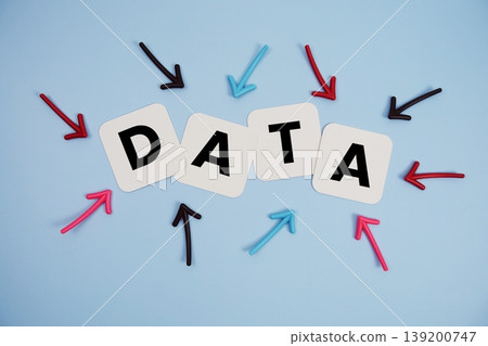 word "DATA" on cards with colorful arrows pointing toward it, highlighting the concept of information 139200747