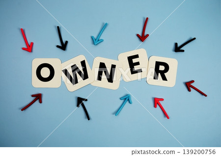 word "OWNER" on cards with colorful arrows pointing toward it, highlighting the concept of management word "OWNER" on cards with colorful arrows pointing toward it, highlighting the concept of management 139200756