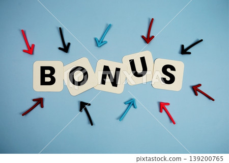 word "BONUS" on cards with colorful arrows pointing toward it, highlighting the concept of benefit word "BONUS" on cards with colorful arrows pointing toward it, highlighting the concept of benefit 139200765