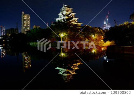 The nighttime scenery of Hiroshima Castle illuminated by light The nighttime scenery of Hiroshima Castle illuminated by light 139200803