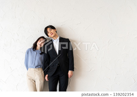 Young men and women cuddling with smiles 139202354