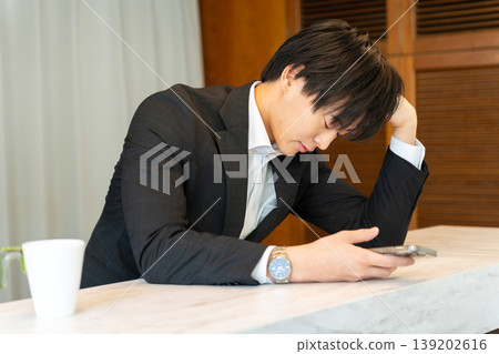depressed businessman depressed businessman 139202616