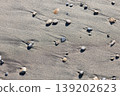 stones washed up on the beach 139202623