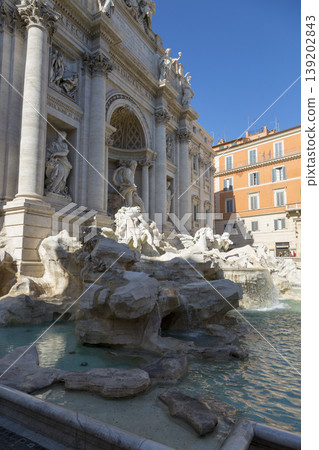 Rome, Italy - August 16, 2019: View of the Trevi Fountain - Rome's largest fountain. Rome, Italy - August 16, 2019: View of the Trevi Fountain - Rome's largest fountain. 139202843