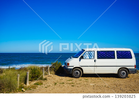 Camper van on beach, camping on nature Camper van on beach, camping on nature 139203825