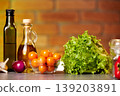The cook is preparing food. 139203891