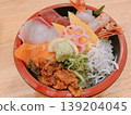 A luxurious seafood bowl topped with fresh ingredients. 139204045
