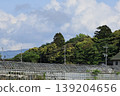 A landscape with a house 139204656