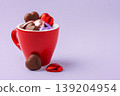 Sweet chocolate hearts in red espresso cup for love concept, pastel purple background 139204954