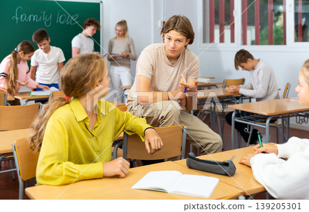 Teenagers during recess in school Teenagers during recess in school 139205301