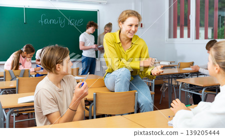 Teenagers during recess in school 139205444
