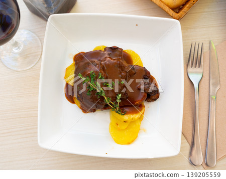 Spanish dish galtas al chocolate, pork cheeks in dark chocolate Spanish dish galtas al chocolate, pork cheeks in dark chocolate 139205559
