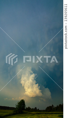 Storm clouds of thunderstorm over a field in Lithuania 139205611
