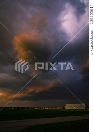 Storm clouds of thunderstorm over a field in Lithuania 139205614