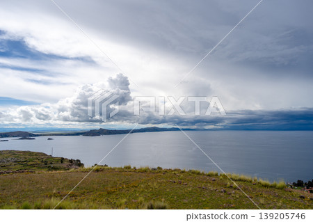 Terraced fields on Amantani Island overlooking Lake Titicaca, Peru Terraced fields on Amantani Island overlooking Lake Titicaca, Peru 139205746