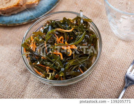 Traditional vegetable appetizer, salad of fresh seaweed. Traditional vegetable appetizer, salad of fresh seaweed. 139205771