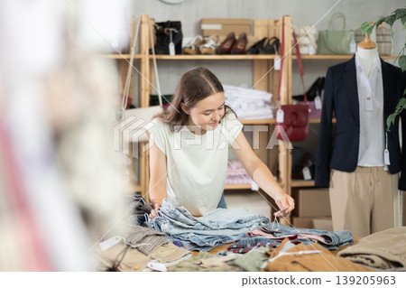 Teen chooses jeans Teen chooses jeans 139205963