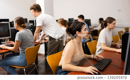 Teenager girl using PC during computer science lesson Teenager girl using PC during computer science lesson 139205978