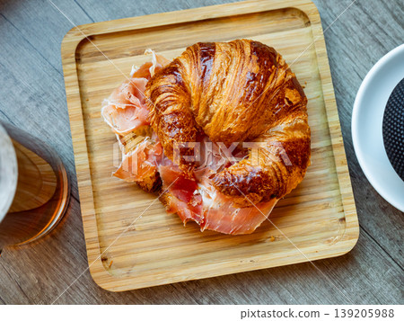 Croissant with ham served on platter Croissant with ham served on platter 139205988