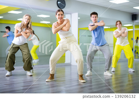 Young girl dancing modern dance in studio Young girl dancing modern dance in studio 139206132