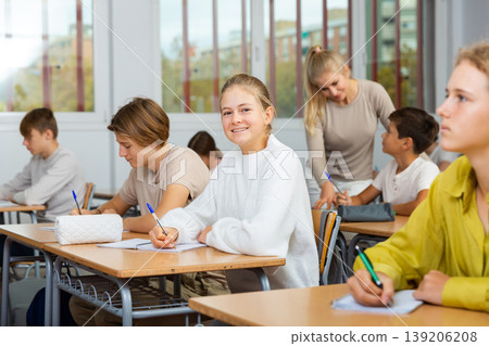 Group of school kids and teacher during lesson Group of school kids and teacher during lesson 139206208