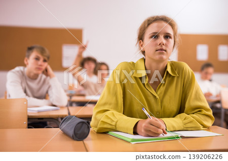 Teenage girl in classroom during lesson in school 139206226
