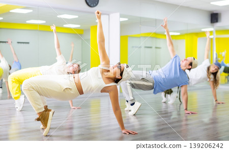Young girl in sunglasses dancing modern dance 139206242