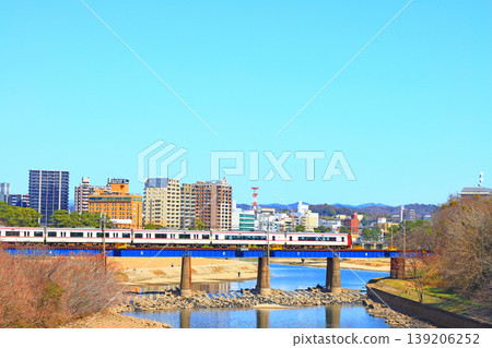 Okazaki City, Aichi Prefecture, scenery of the townscape of Okazaki City and Meitetsu train 139206252