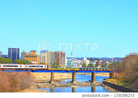 Okazaki City, Aichi Prefecture, scenery of the townscape of Okazaki City and Meitetsu train 139206253