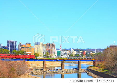 Okazaki City, Aichi Prefecture, scenery of the townscape of Okazaki City and Meitetsu train Okazaki City, Aichi Prefecture, scenery of the townscape of Okazaki City and Meitetsu train 139206254