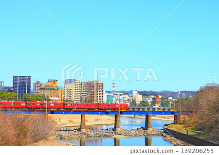 Okazaki City, Aichi Prefecture, scenery of the townscape of Okazaki City and Meitetsu train Okazaki City, Aichi Prefecture, scenery of the townscape of Okazaki City and Meitetsu train 139206255