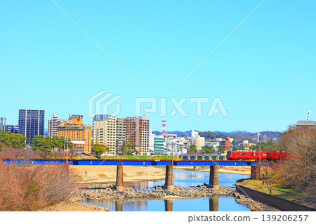 Okazaki City, Aichi Prefecture, scenery of the townscape of Okazaki City and Meitetsu train Okazaki City, Aichi Prefecture, scenery of the townscape of Okazaki City and Meitetsu train 139206257