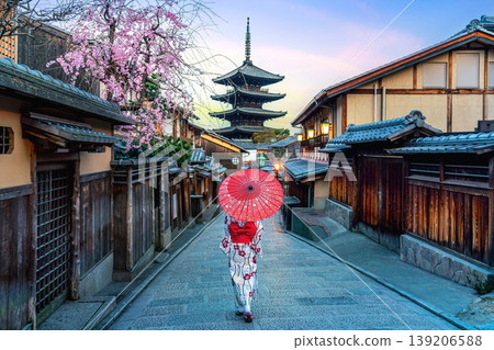 Asian woman wearing japanese traditional kimono at Yasaka Pagoda and Sannen Zaka Street in Kyoto, Japan. Asian woman wearing japanese traditional kimono at Yasaka Pagoda and Sannen Zaka Street in Kyoto, Japan. 139206588