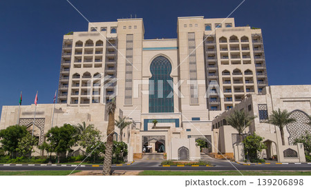 Building of luxurious 5-star hotel in Ajman timelapse hyperlapse nestled near the turquoise waters of Arabian Gulf. Building of luxurious 5-star hotel in Ajman timelapse hyperlapse nestled near the turquoise waters of Arabian Gulf. 139206898
