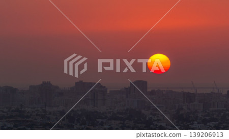 Sunset in Ajman aerial view from rooftop timelapse. United Arab Emirates. Sunset in Ajman aerial view from rooftop timelapse. United Arab Emirates. 139206913