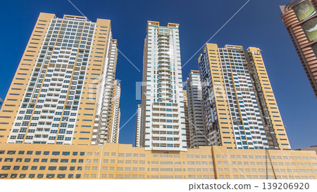 Modern new towers in Ajman timelapse hyperlapse. Cityscape of Ajman. Modern new towers in Ajman timelapse hyperlapse. Cityscape of Ajman. 139206920