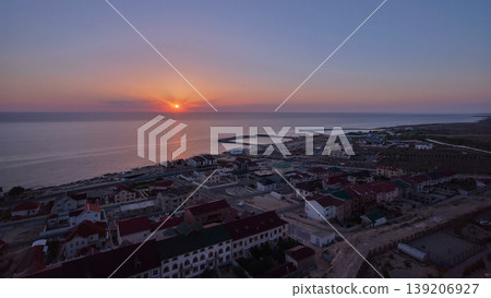 Aktau city on the shore of the Caspian Sea at sunset timelapse. Kazakhstan. 139206927