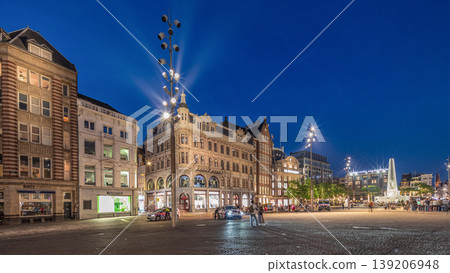 The Dam square in Amsterdam day to night timelapse panorama, The Netherlands. The Dam square in Amsterdam day to night timelapse panorama, The Netherlands. 139206948