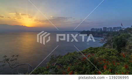 Seascape timelapse of high mountains over clear sunset sky in Turkey Seascape timelapse of high mountains over clear sunset sky in Turkey 139206995