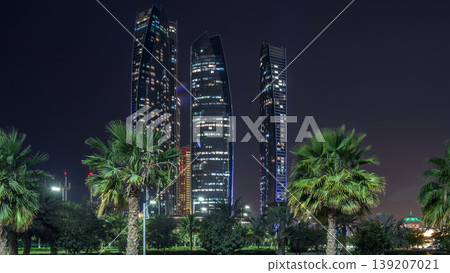 Skyscrapers of Abu Dhabi at night with Etihad Towers buildings timelapse. Skyscrapers of Abu Dhabi at night with Etihad Towers buildings timelapse. 139207021