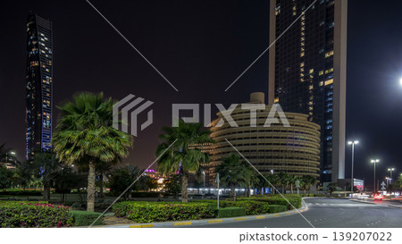 Skyscrapers of Abu Dhabi at night with Etihad Towers buildings timelapse. Skyscrapers of Abu Dhabi at night with Etihad Towers buildings timelapse. 139207022