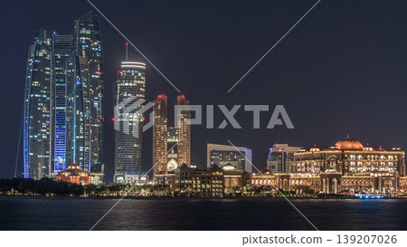 Skyscrapers of Abu Dhabi at night with Etihad Towers buildings timelapse. Skyscrapers of Abu Dhabi at night with Etihad Towers buildings timelapse. 139207026