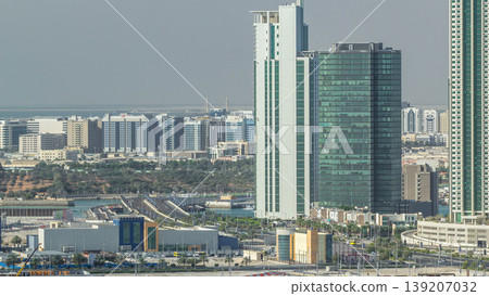 Buildings on Al Reem island in Abu Dhabi timelapse from above. Buildings on Al Reem island in Abu Dhabi timelapse from above. 139207032